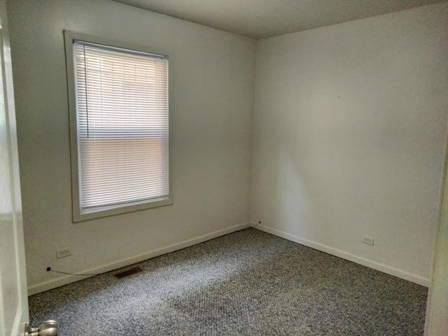 empty room featuring carpet