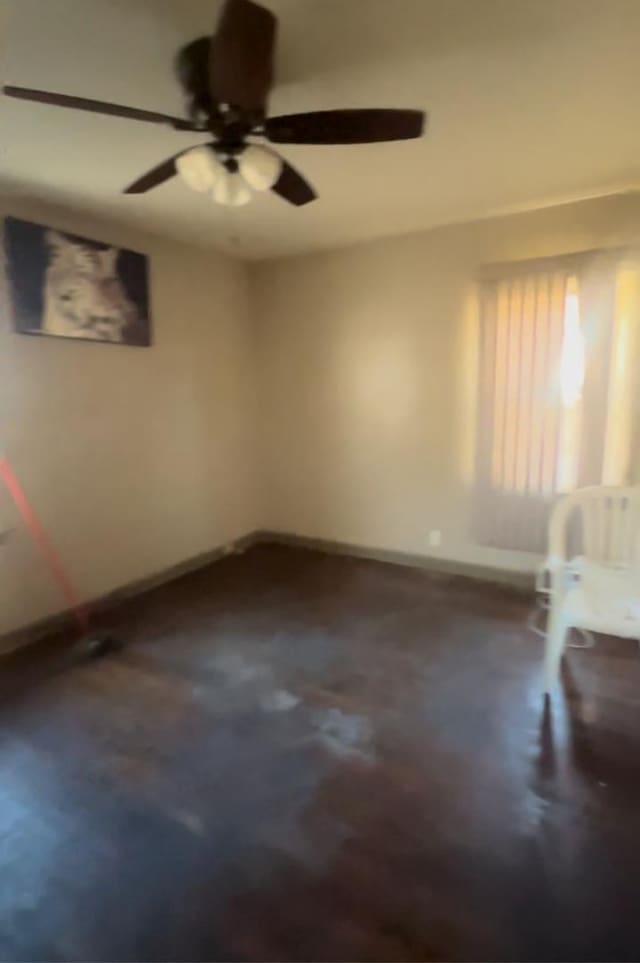 empty room featuring ceiling fan