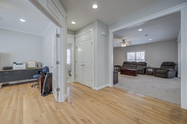 interior space featuring light hardwood / wood-style flooring and ornamental molding