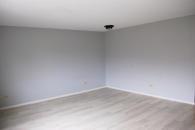 empty room with light wood-type flooring