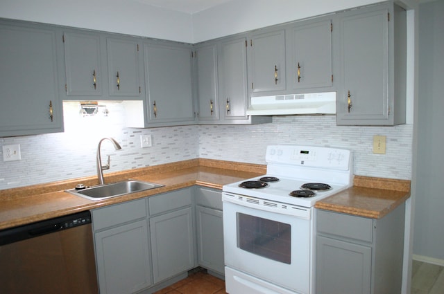 kitchen with stainless steel dishwasher, white electric stove, and gray cabinetry