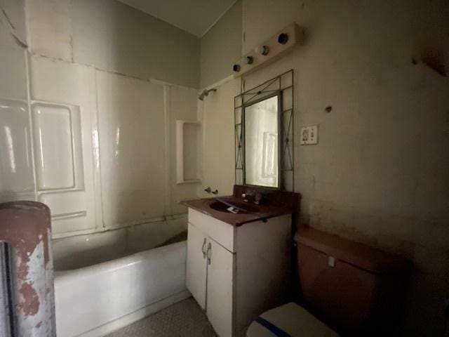 bathroom featuring toilet and vanity