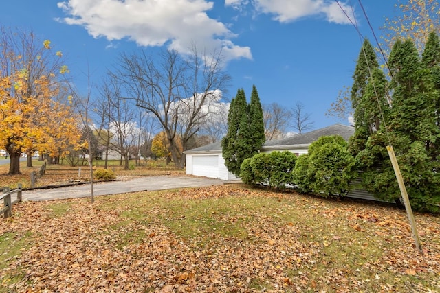 view of yard featuring a garage