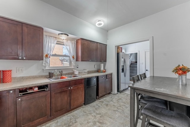 kitchen with sink, fridge, and stainless steel fridge with ice dispenser