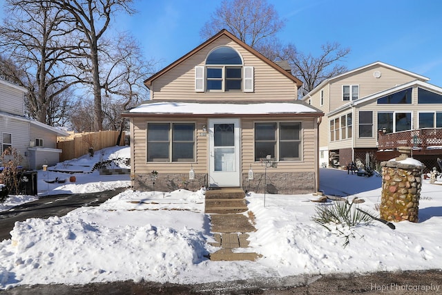 view of front of home with fence