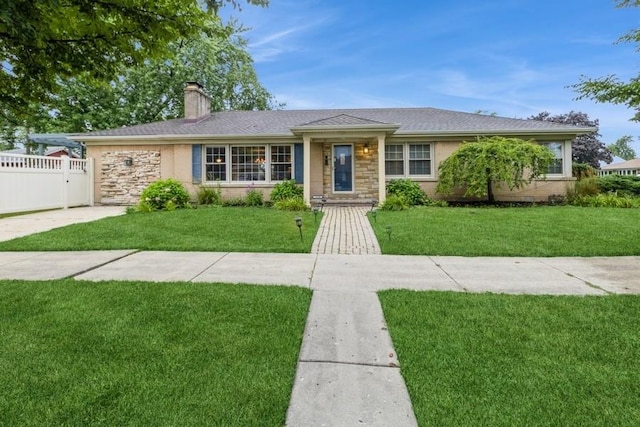 ranch-style house featuring stone siding, a front lawn, a chimney, and fence