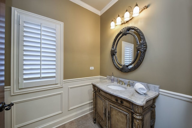 bathroom with tile patterned floors, vanity, and ornamental molding