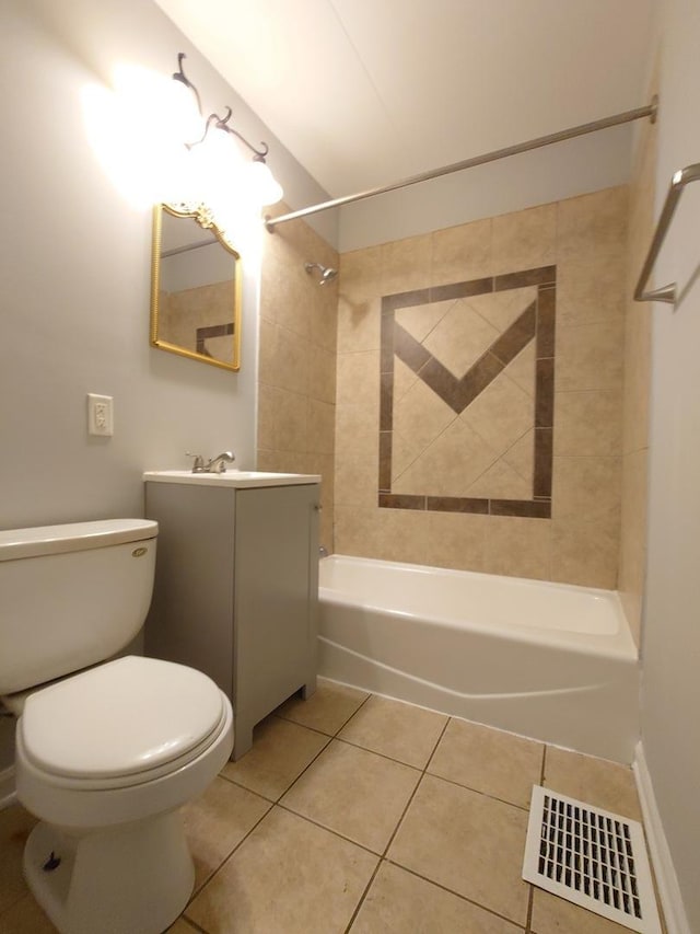 bathroom featuring toilet, vanity, visible vents, tub / shower combination, and tile patterned floors