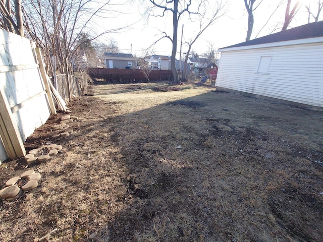 view of yard with fence