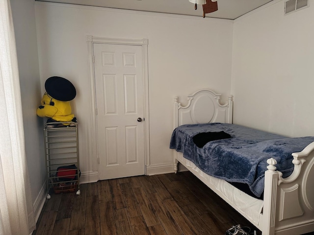 bedroom featuring dark wood-type flooring