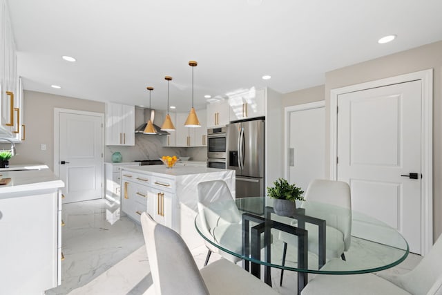 dining area featuring recessed lighting and marble finish floor