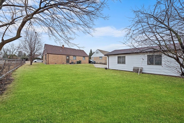 view of yard with fence