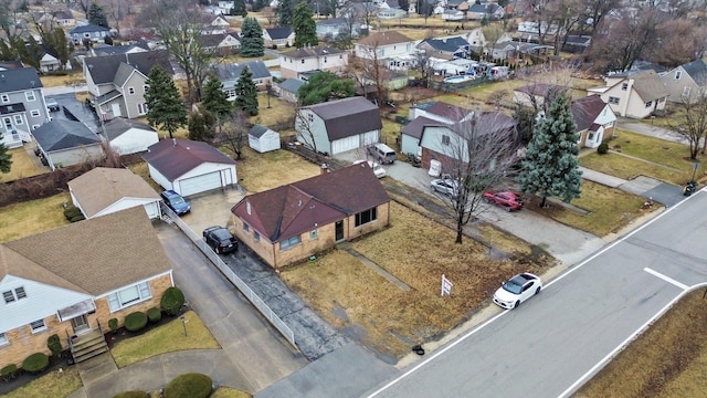 birds eye view of property with a residential view