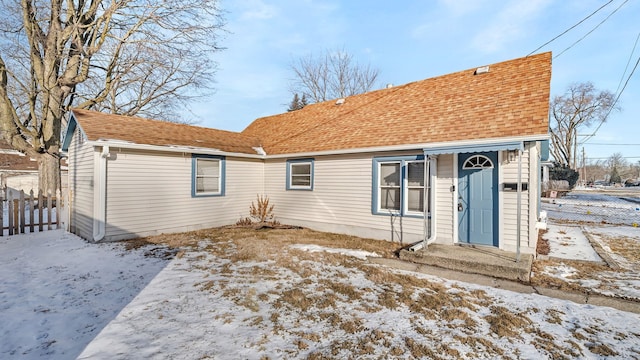 view of snow covered house