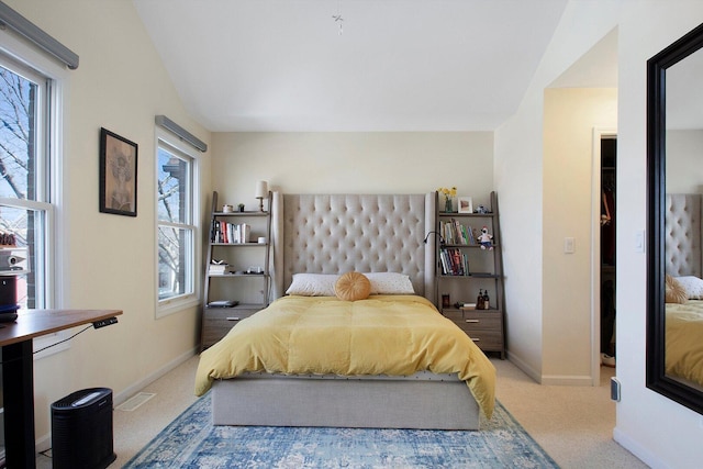 bedroom with visible vents, baseboards, and carpet