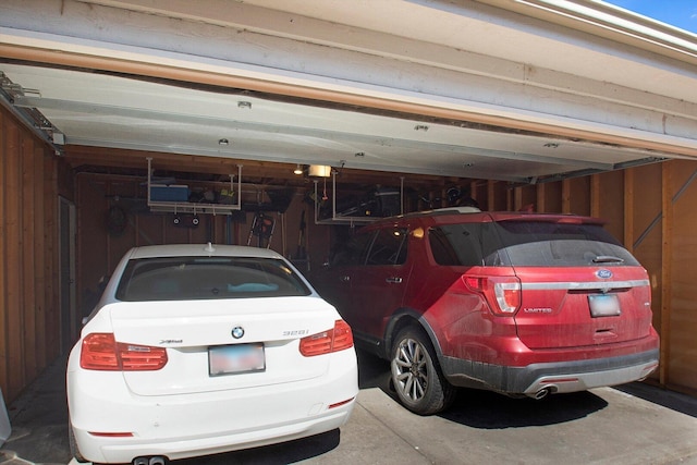 garage featuring a garage door opener