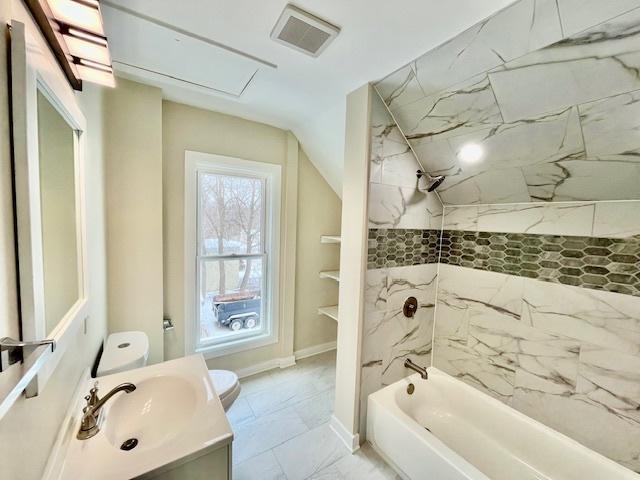 bathroom with marble finish floor, shower / bathtub combination, visible vents, toilet, and vanity