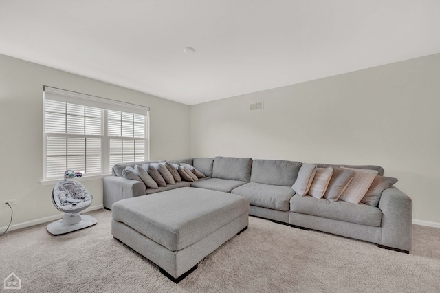 living room with light colored carpet