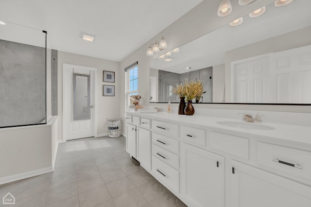 bathroom with vanity and tile patterned flooring