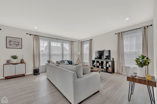 living room with light hardwood / wood-style floors