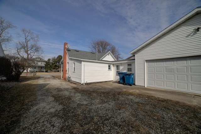 garage with driveway