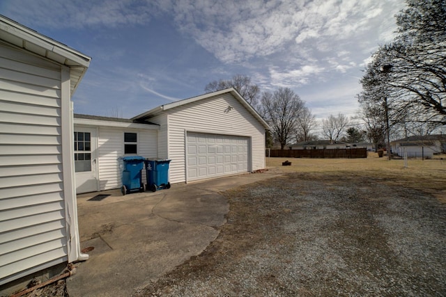 detached garage with fence