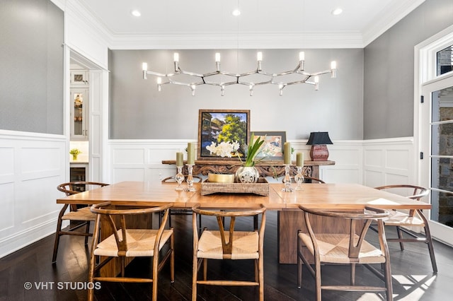 dining space with ornamental molding, dark wood finished floors, and recessed lighting