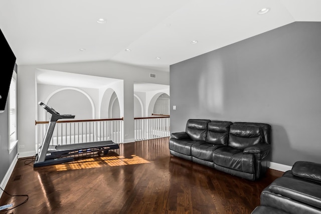 living room with vaulted ceiling, dark wood-style flooring, recessed lighting, and baseboards