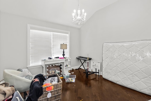 misc room with vaulted ceiling, dark wood-type flooring, a notable chandelier, and baseboards