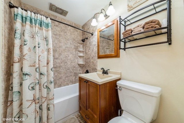 bathroom featuring toilet, visible vents, shower / bath combination with curtain, and vanity