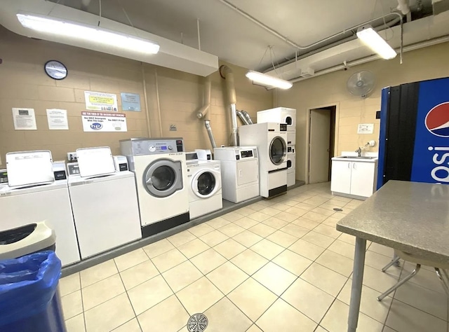 laundry area featuring washer and dryer and sink