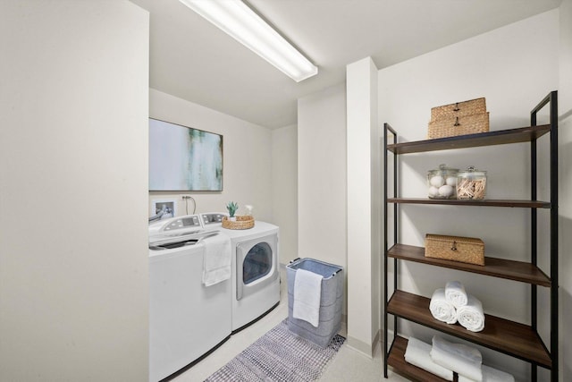 laundry room featuring laundry area and washer and clothes dryer