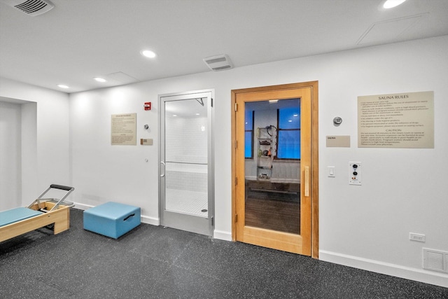 interior space with recessed lighting, visible vents, and baseboards