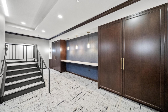 interior space featuring recessed lighting and crown molding