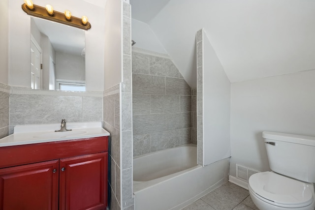 bathroom with shower / bath combination, visible vents, toilet, tile patterned floors, and vanity