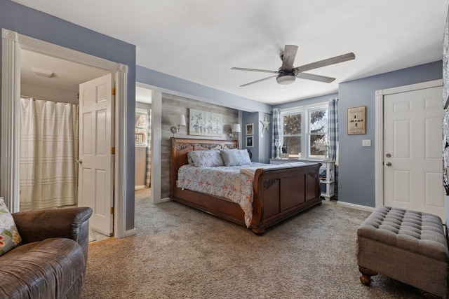 bedroom with baseboards, ceiling fan, and light colored carpet