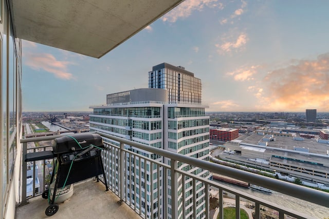 701 S Wells St Unit 3105, Chicago, IL 60607 - balcony at dusk featuring a view of city and a grill