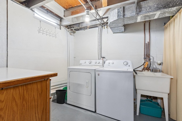 laundry area with laundry area and washing machine and clothes dryer