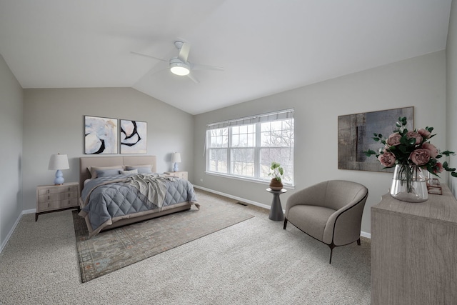 carpeted bedroom with vaulted ceiling, ceiling fan, visible vents, and baseboards