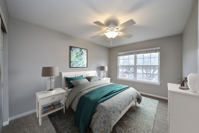 carpeted bedroom featuring a ceiling fan and baseboards