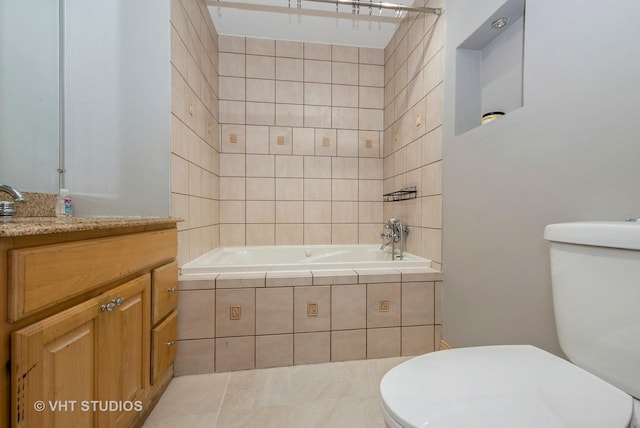 bathroom with tiled bath, a shower, toilet, tile patterned floors, and vanity