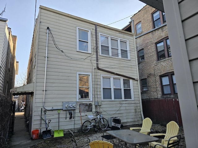 2320 W Addison St, Chicago, IL 60618 - rear view of house featuring fence