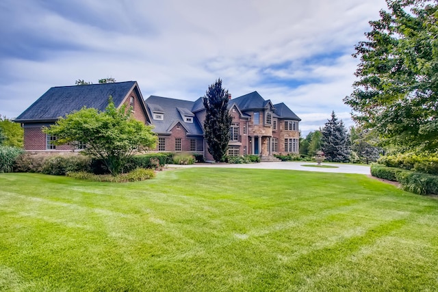 view of front of property with a front lawn