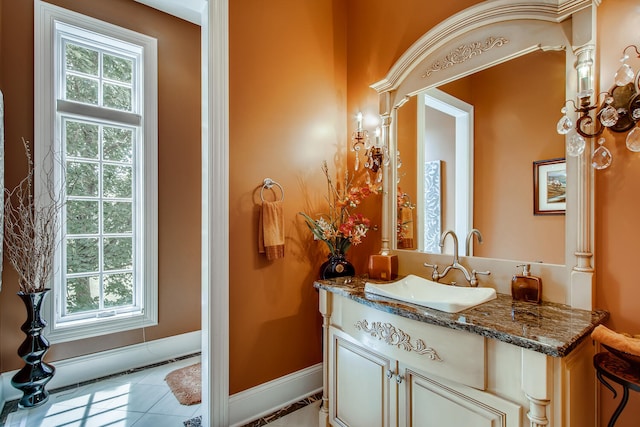 bathroom with vanity and tile patterned floors