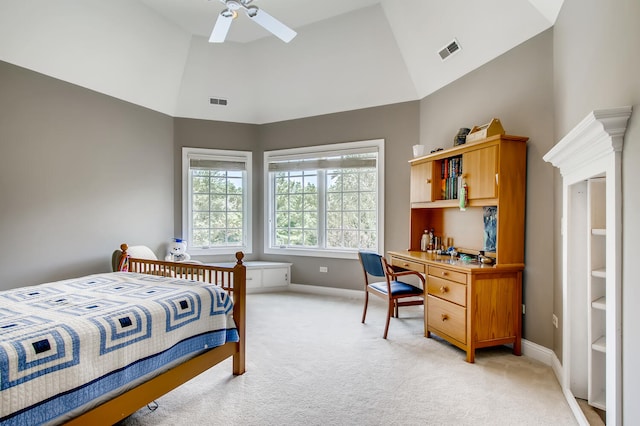 carpeted bedroom with high vaulted ceiling and ceiling fan