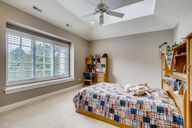 bedroom with lofted ceiling, ceiling fan, and carpet floors