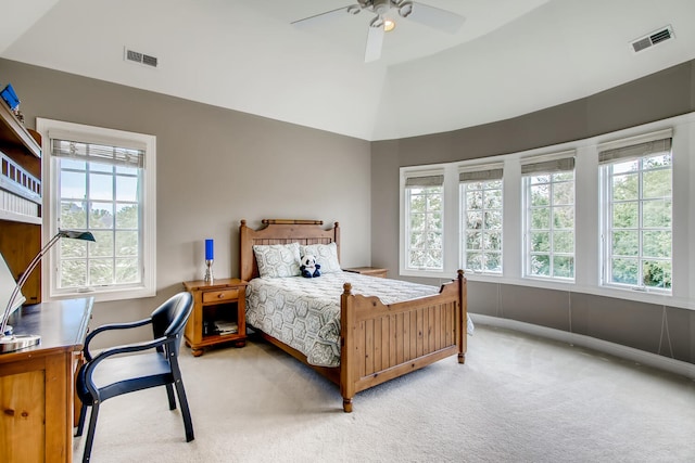 carpeted bedroom with lofted ceiling and ceiling fan