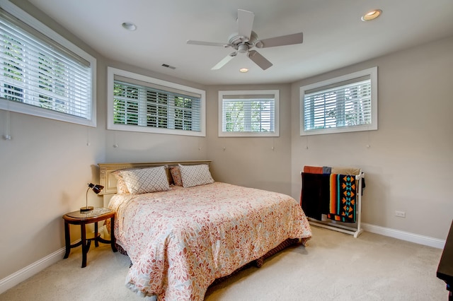 bedroom with ceiling fan and carpet