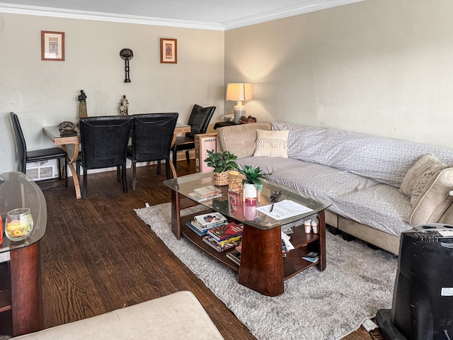 living room featuring dark wood-type flooring and crown molding