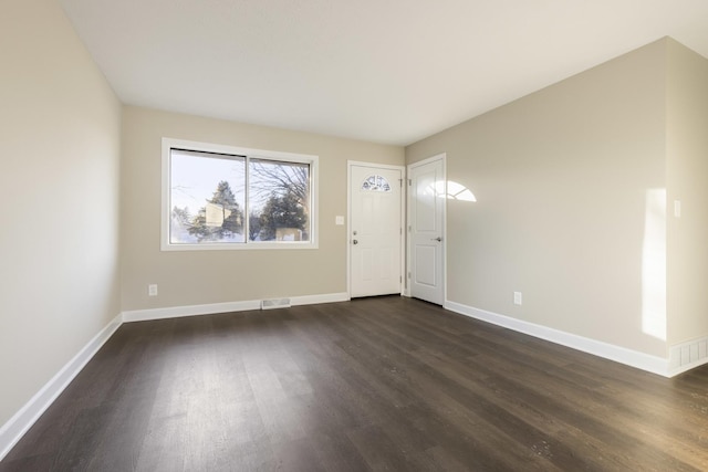 interior space with dark hardwood / wood-style floors